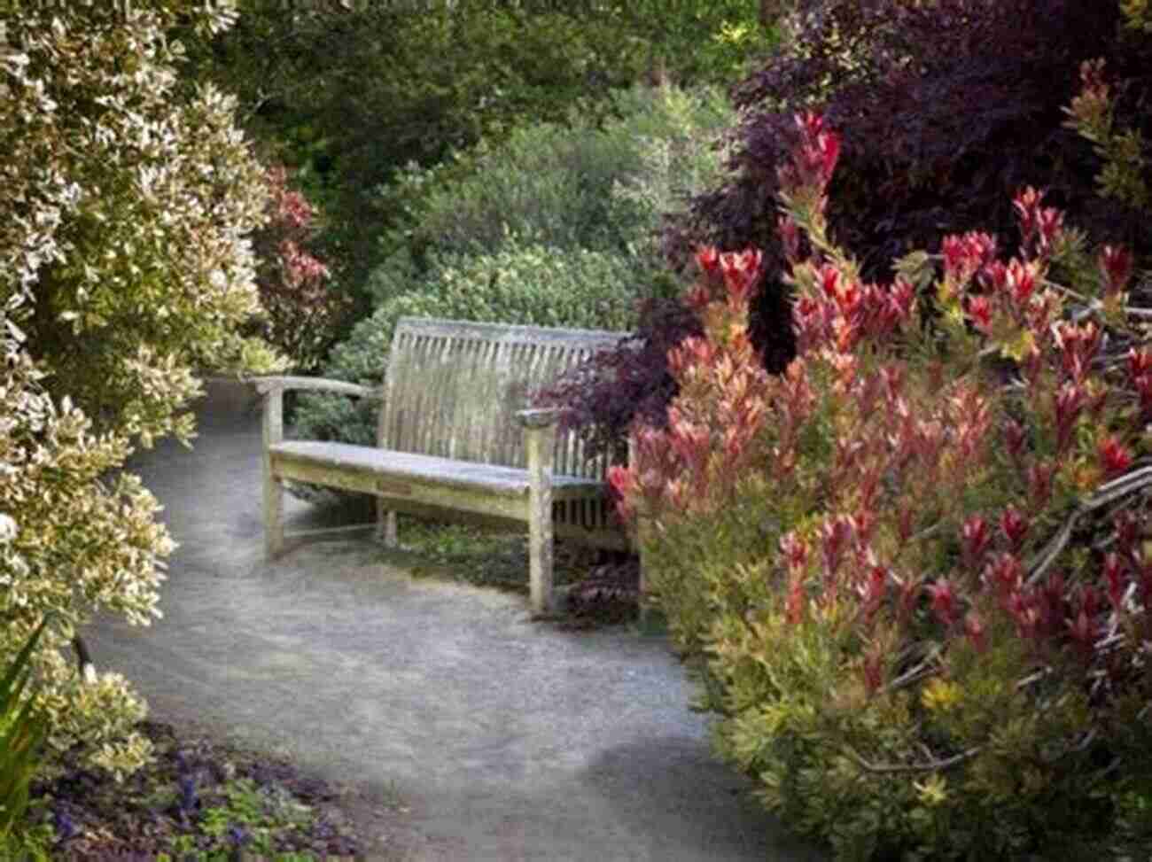 A Canary Yellow Bench Pillow Placed On A Wooden Bench In A Blooming Garden During The Spring Season Bench Pillows For All Seasons