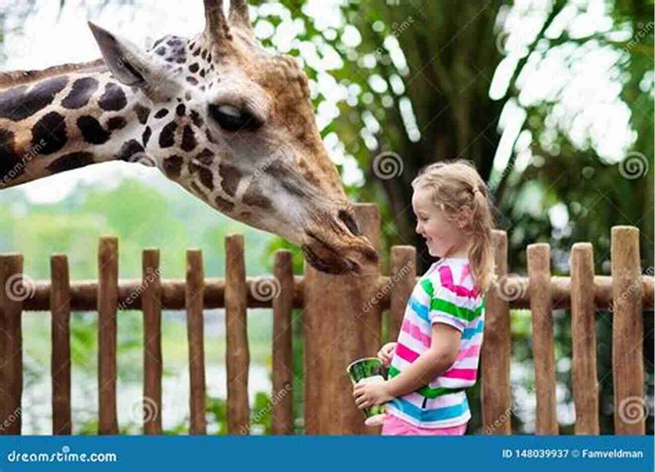 A Child Feeding A Giraffe At The Nashville Zoo KIDS LOVE TENNESSEE 4th Edition: Your Family Travel Guide To Exploring Kid Friendly Tennessee 500 Fun Stops Unique Spots (Kids Love Travel Guides)