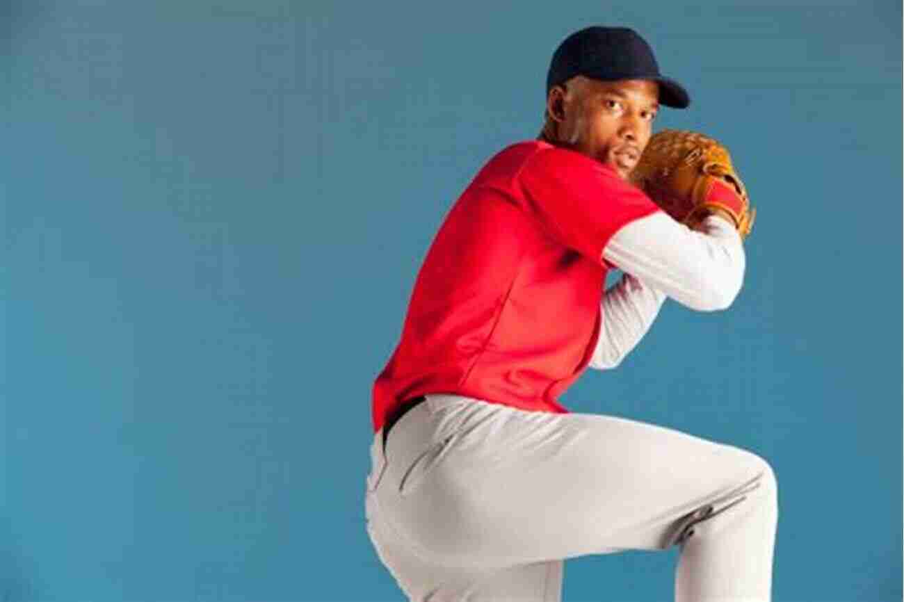 A Determined Baseball Player Winding Up To Strike A Home Run How To Play Baseball: Reasons Good For Kids Basic Baseball Rules And More: How To Play Baseball For Kids