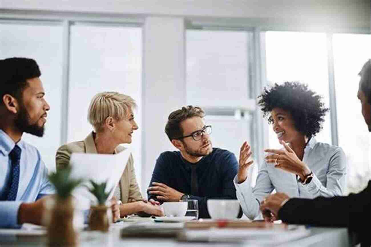 A Group Of Sports Business Professionals Discussing Strategies In A Boardroom Sports Business Management: Decision Making Around The Globe