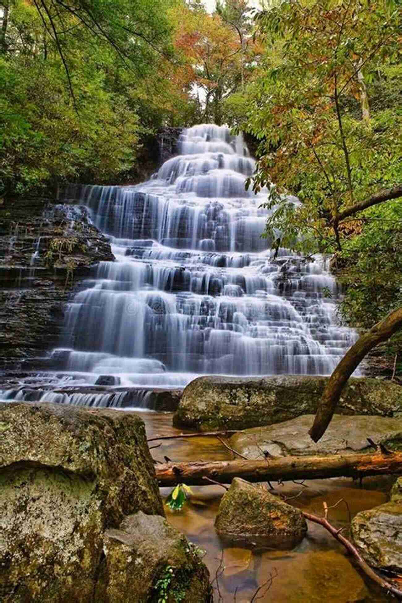 A Magnificent Waterfall Cascading Down Rocks Surrounded By Lush Greenery Best Hikes Houston: The Greatest Views Wildlife And Forest Strolls (Best Hikes Near Series)