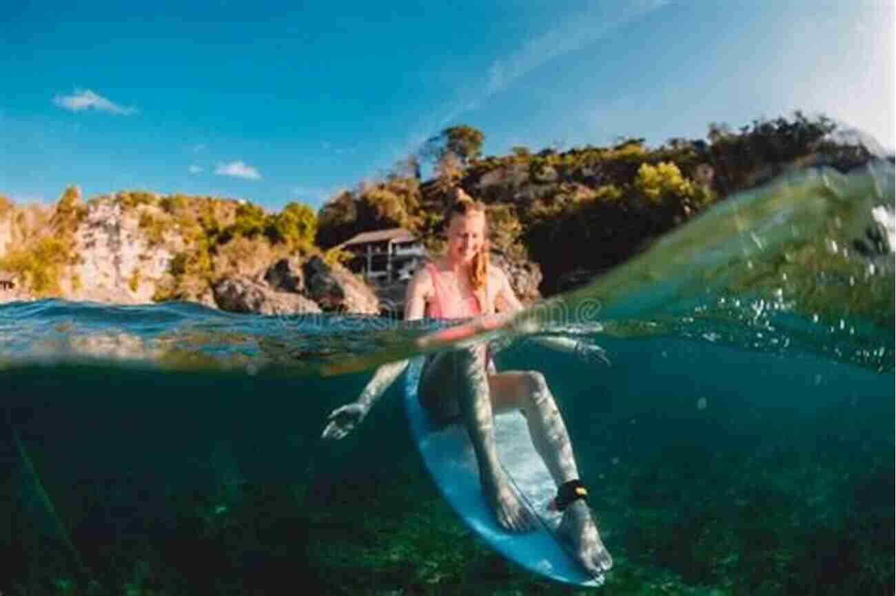 A Surfer Sitting On Their Board, Eyes Closed, Embracing The Tranquility And Peace While Meditating In The Water Surfing And Spirituality Tabitha Suzuma