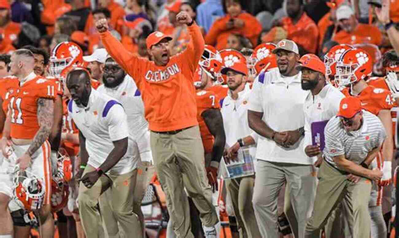 Clemson Players Celebrating A Victory Under Coach Swinney's Guidance Dabo S World: The Life And Career Of Coach Swinney And The Rise Of Clemson Football