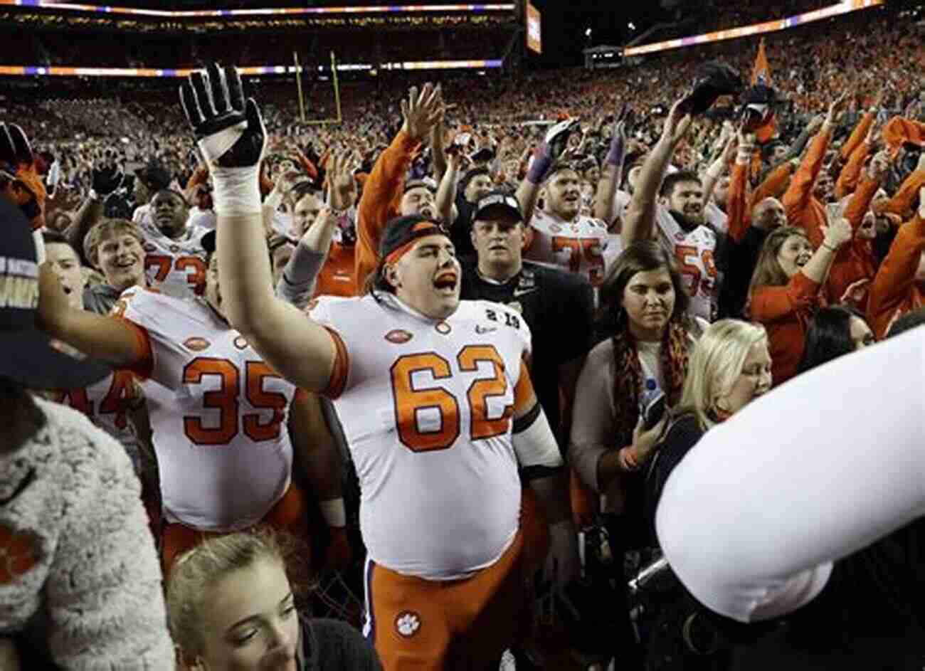 Clemson Players Celebrating Their National Championship Victory Dabo S World: The Life And Career Of Coach Swinney And The Rise Of Clemson Football