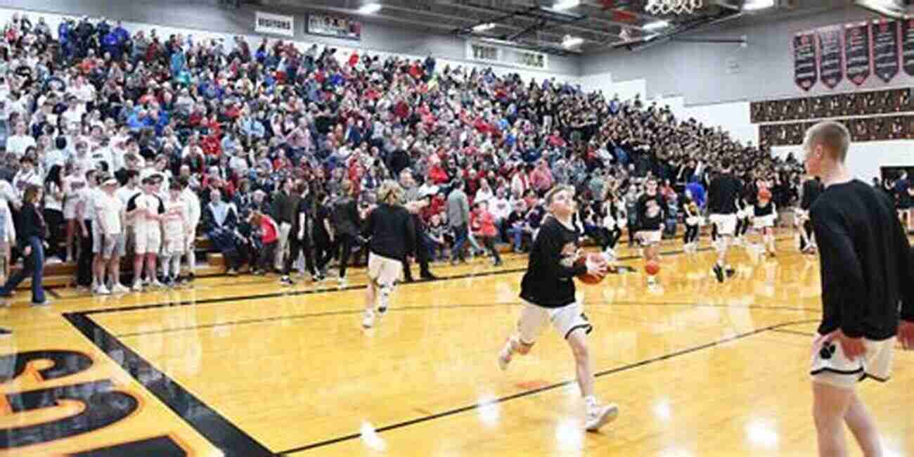 High School Basketball Team Playing In A Packed Gymnasium Winning Ways Basketball: Effective Zone Offenses For The High School Coach