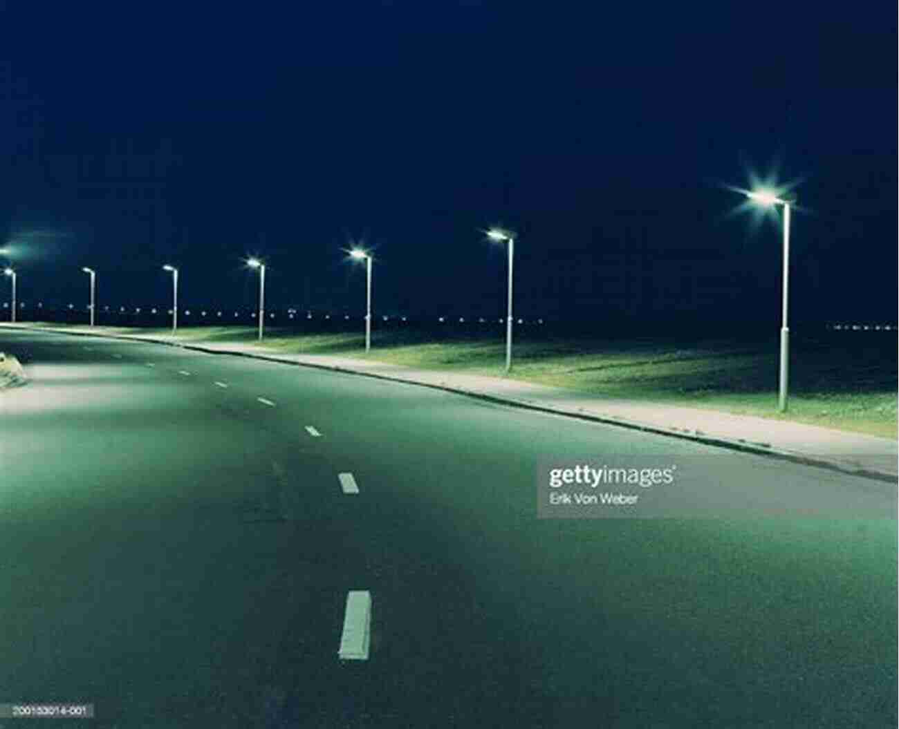 Night Driving On An Empty Road With Glowing Streetlights At Midnight Night Driving: Notes From A Prodigal Soul