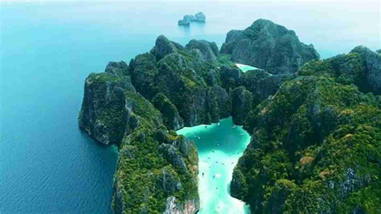 Phi Phi Islands Crystal Clear Turquoise Waters Surrounded By Limestone Cliffs And Vibrant Marine Life. Capture The Beauty Of Thailand! Amazing Thailand: Photo For Tourist